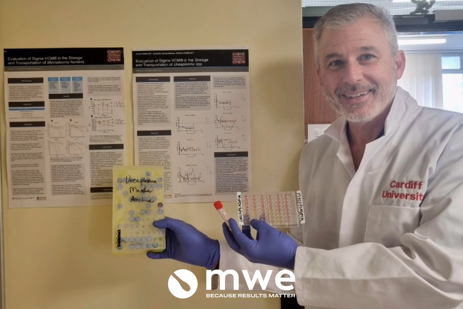 Dr Brad Spiller stands to the side, showing posters and recovered organisms with SIGMA-VCM™